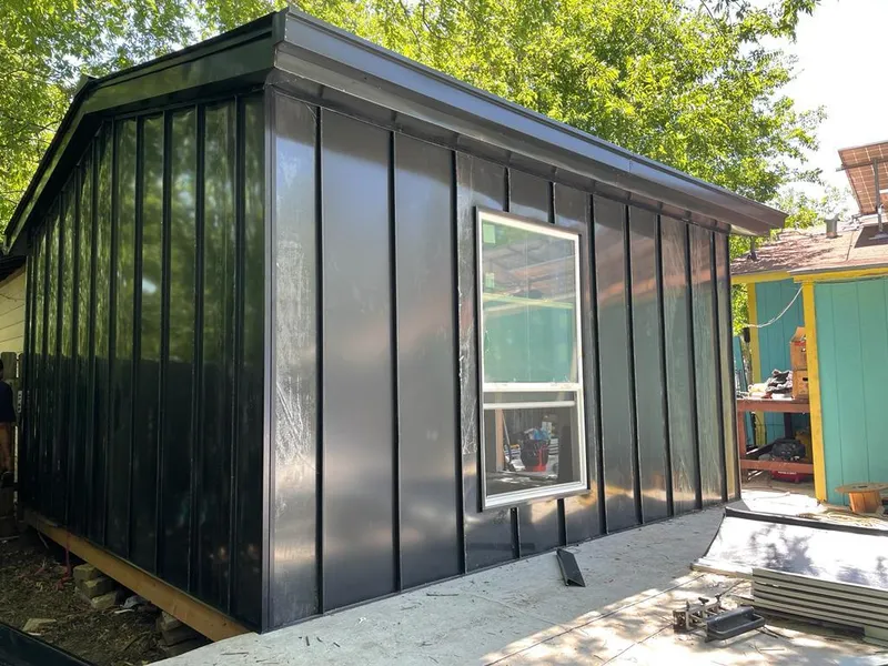Black standing seam metal wall panels for Metal Roof Installation in Forest Glen