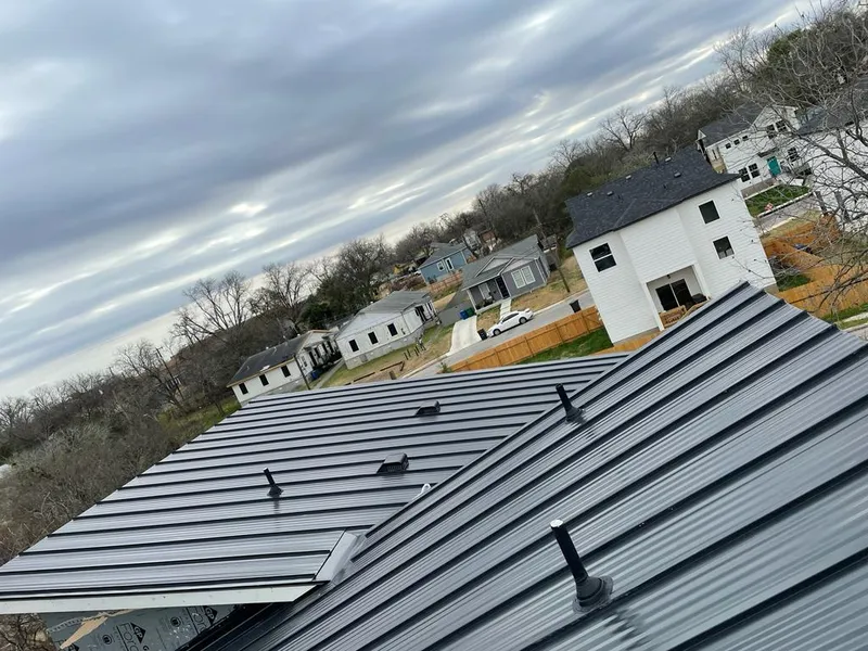 Standing seam metal roof panels with vents for Skylight Repair in Forest Glen